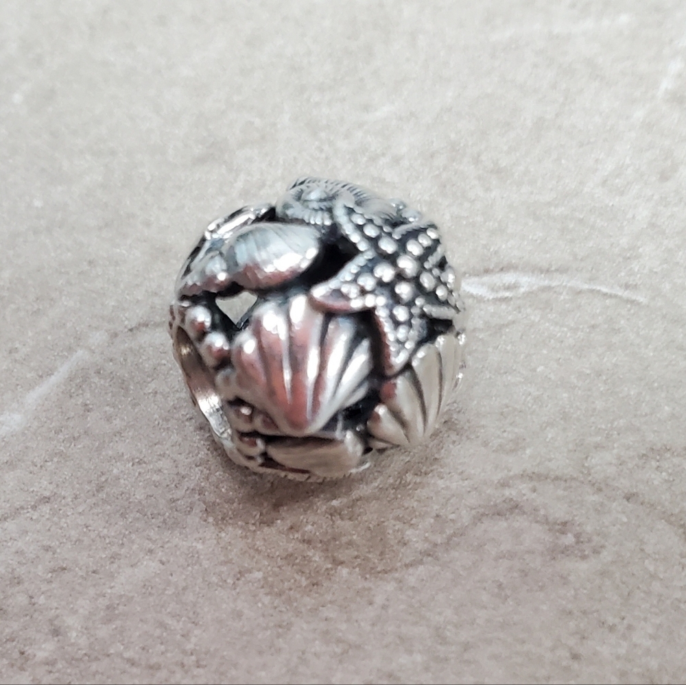 Pandora seashell charm